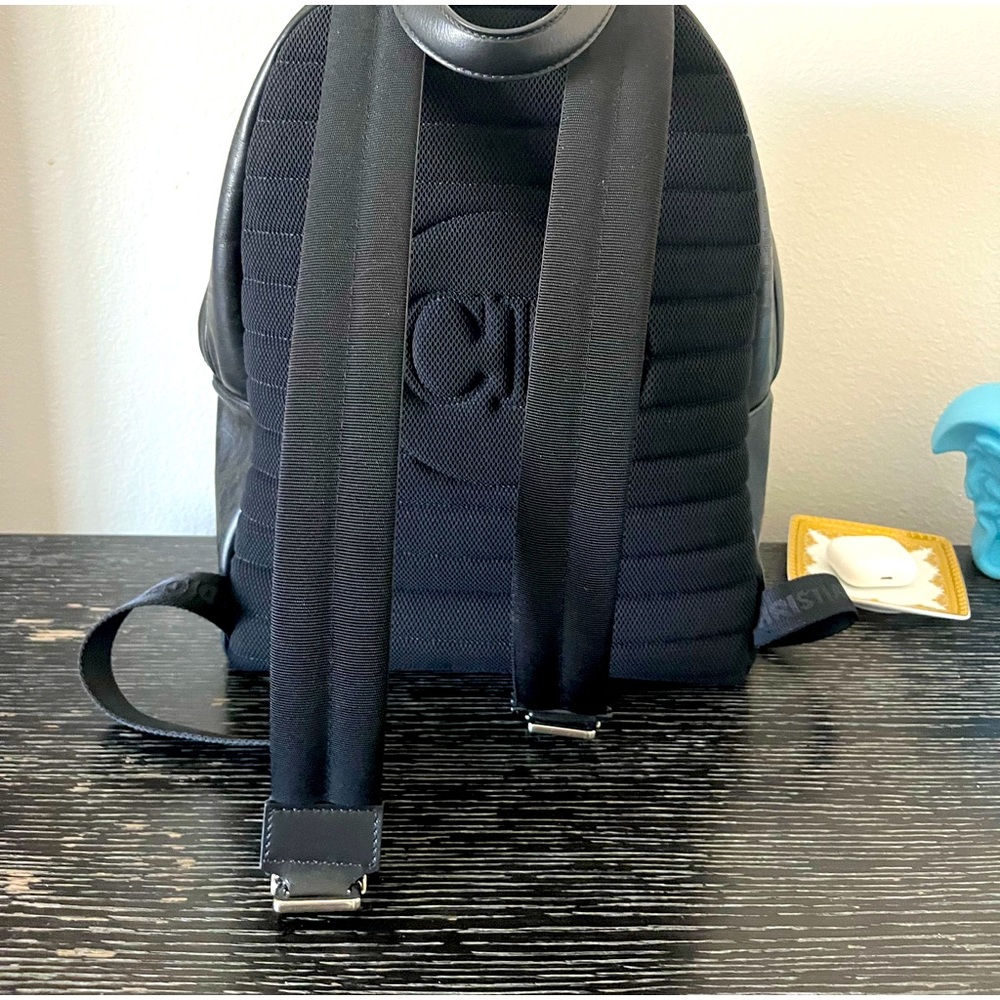 COPY - COPY - RIDER BACKPACK
Black CD Canvas and Smooth Calfskin